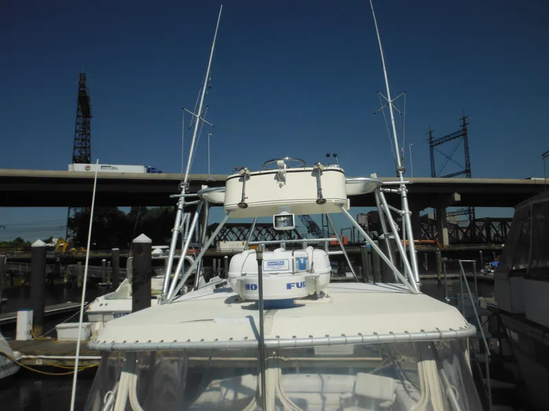 Slide: The Image of 1985 Blackfin 29 Combi boat docked at a marina. - 35