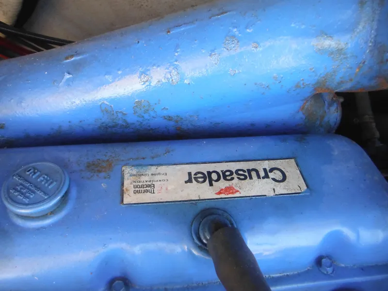 Slide: The Image of Close-up of Crusader engine in 1985 Blackfin 29 Combi boat. - 41