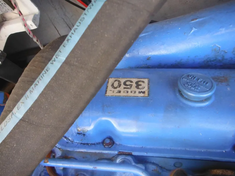 Slide: The Image of Close-up of a 1985 Blackfin 29 Combi engine, Model 350, with blue paint. - 42