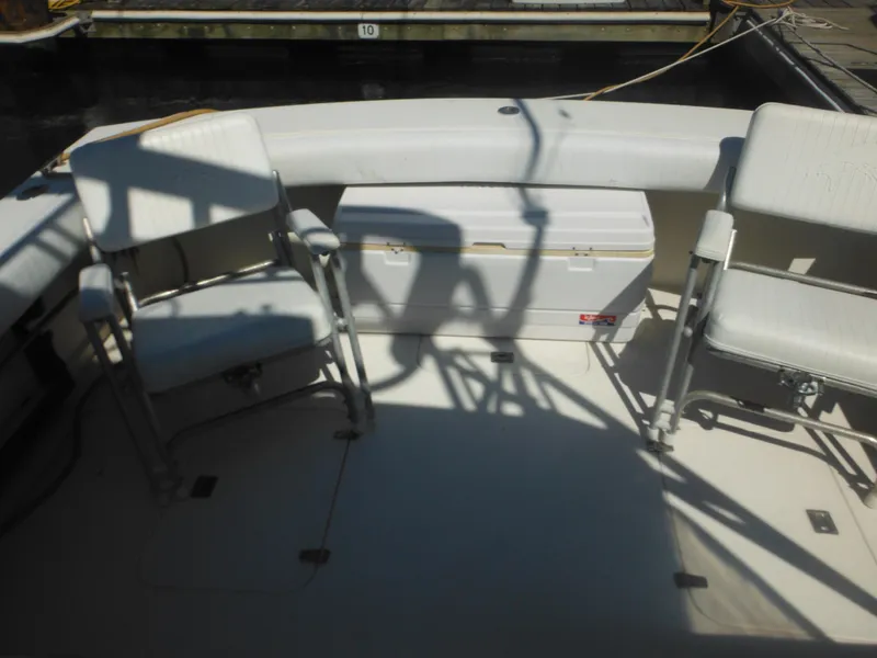 Slide: The Image of Interior of 1985 Blackfin 29 Combi boat with seating and cooler. - 5