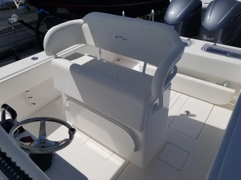 Slide: The Image of 2024 Contender 30 ST boat helm station with dual outboard engines. - 5