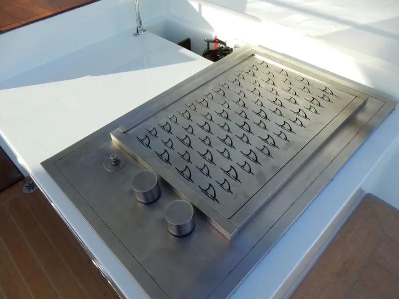 Slide: The Image of Stainless steel grill on 2025 Surfari 50 yacht deck, featuring sleek design and modern controls. - 29