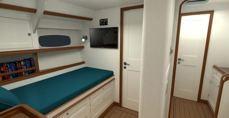 Slide: The Image of Luxurious cabin interior of 2025 Surfari 50 yacht with bed, TV, and wooden accents. - 48