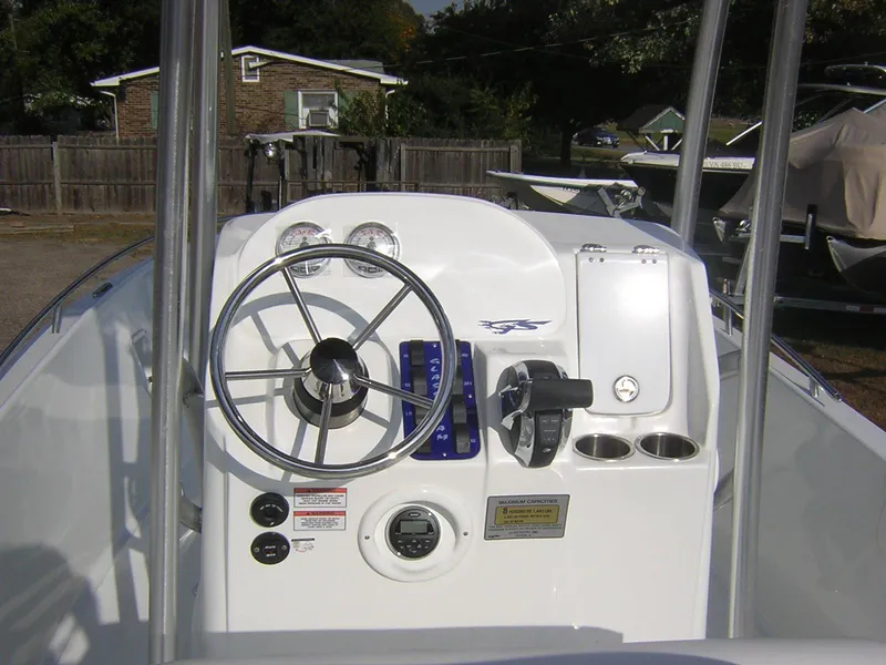 Slide: The Image of Steering console of a 2017 Glasstream 240 boat. - 13