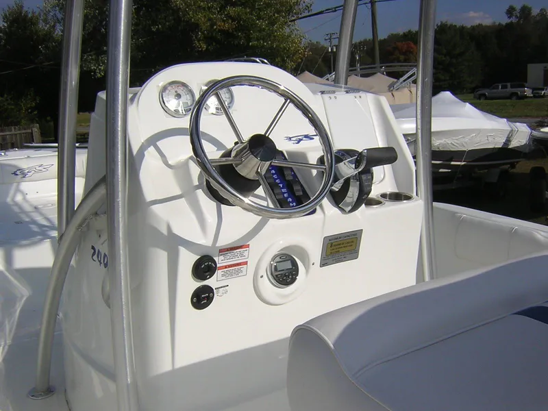 Slide: The Image of Steering console of a 2017 Glasstream 240 boat. - 7