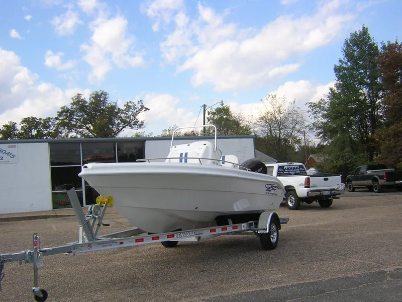 Slide: The Image of 2017 Glasstream 192 CC boat on trailer in front of building. - 4