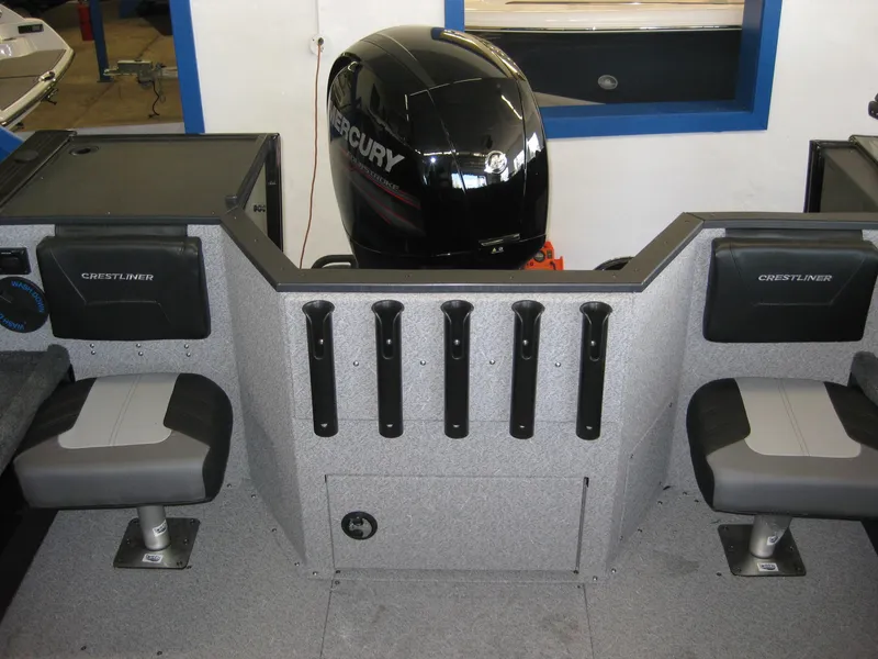 Slide: The Image of Interior of 2025 Crestliner 2050 Commander boat with Mercury outboard motor. - 6