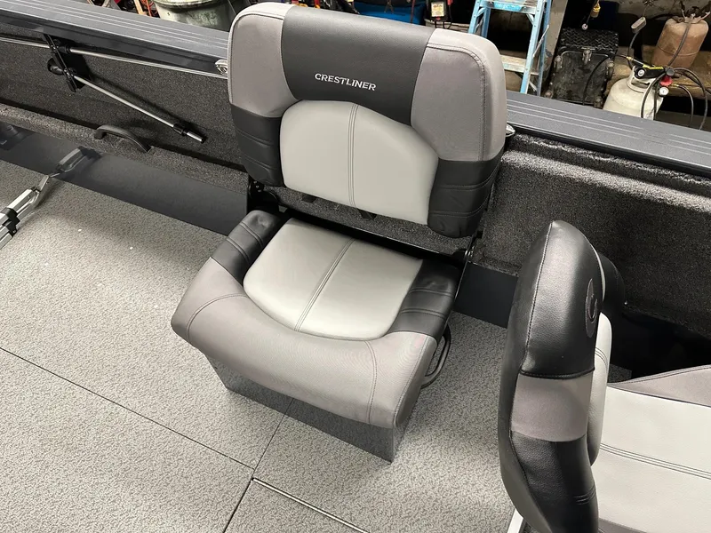 Slide: The Image of Crestliner 2050 Commander 2025 boat seat, gray and black upholstery. - 7