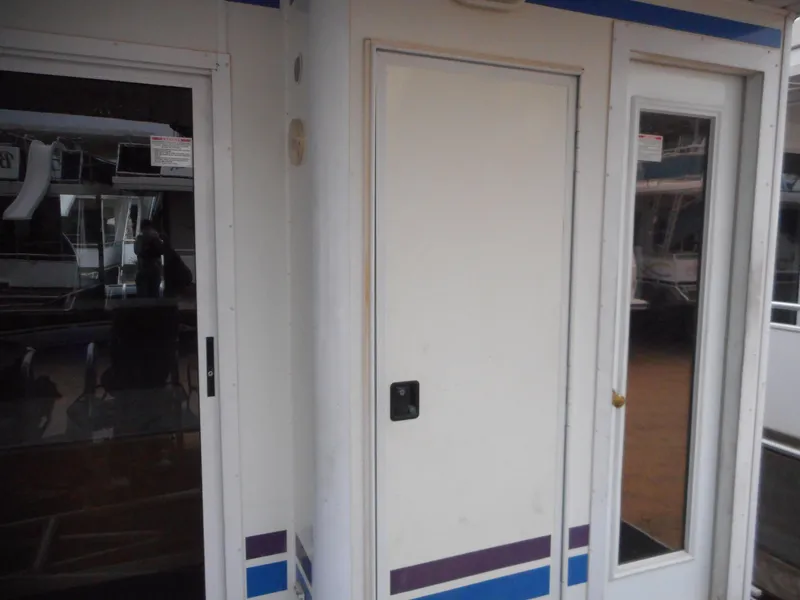 Slide: The Image of 2003 Stardust Cruisers Summer Haven Trip 33 houseboat doors and windows. - 3