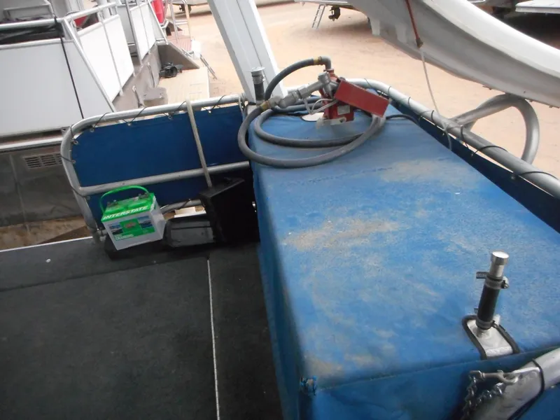 Slide: The Image of 2003 Stardust Cruisers Summer Haven Trip 33 boat deck with equipment and storage. - 33