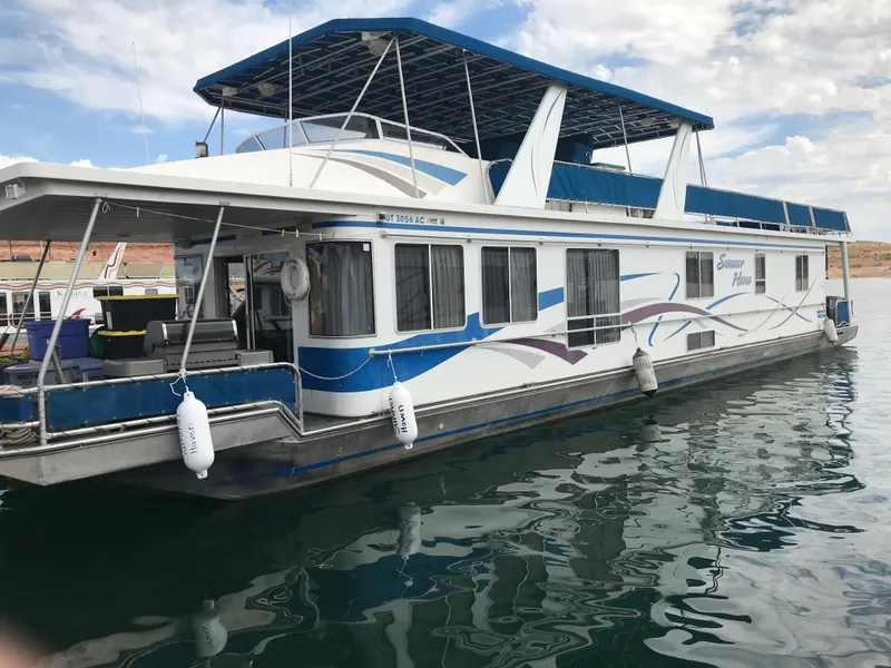 Slide: The Image of 2003 Stardust Cruisers Summer Haven Trip 33 houseboat docked on water. - 41