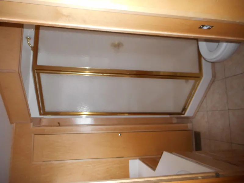 Slide: The Image of Bathroom in 2003 Stardust Cruisers Summer Haven Trip 33 with shower and toilet. - 8