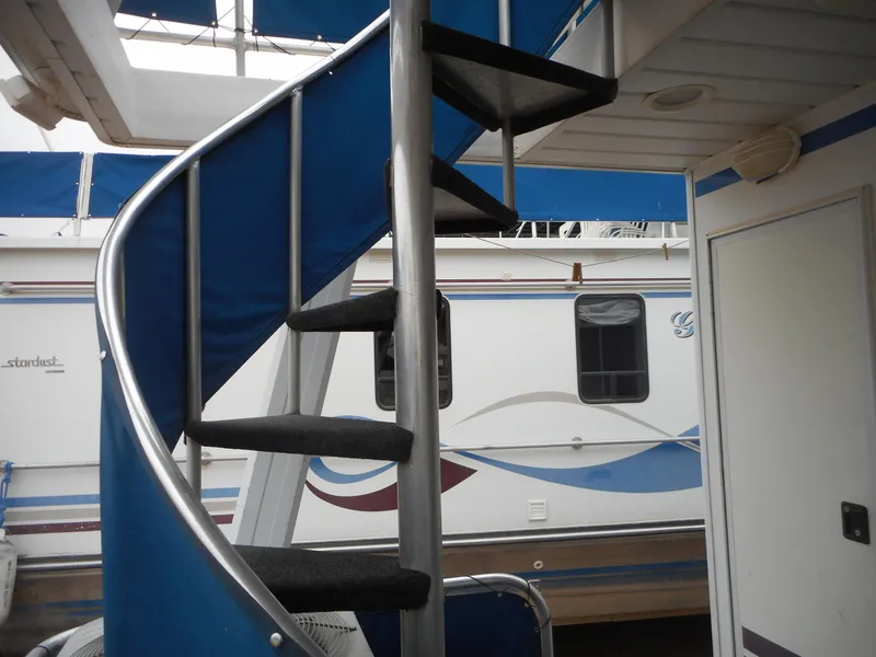 Slide: The Image of 2003 Stardust Cruisers Summer Haven Share #34 & 35 houseboat with spiral staircase. - 10