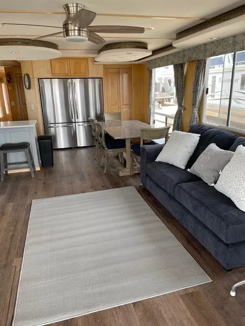 Slide: The Image of Interior of 2003 Stardust Cruisers Summer Haven houseboat with modern kitchen and living area. - 25