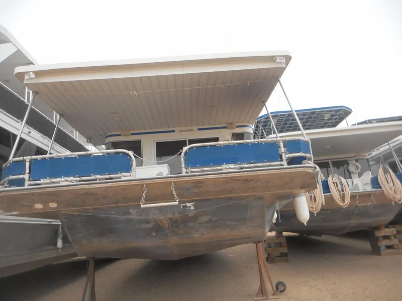 Slide: The Image of 2003 Stardust Cruisers Summer Haven Share #34 & 35 houseboat on dry dock. - 4