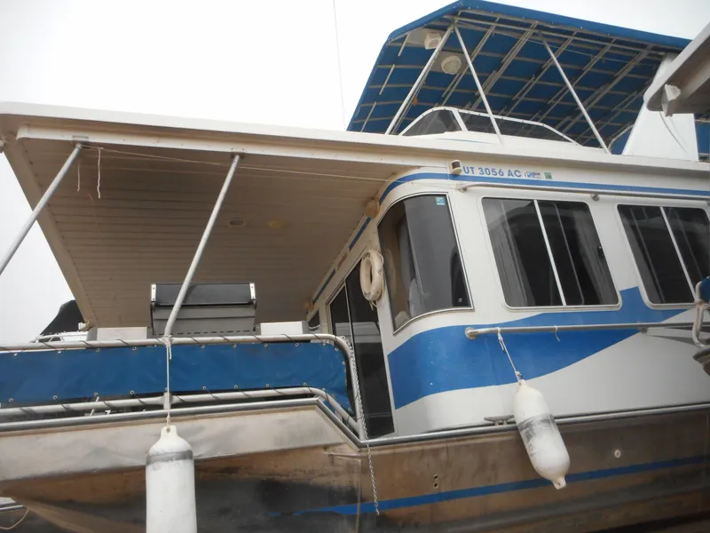 Slide: The Image of 2003 Stardust Cruisers Summer Haven Share #34 & 35 houseboat with blue and white exterior. - 6