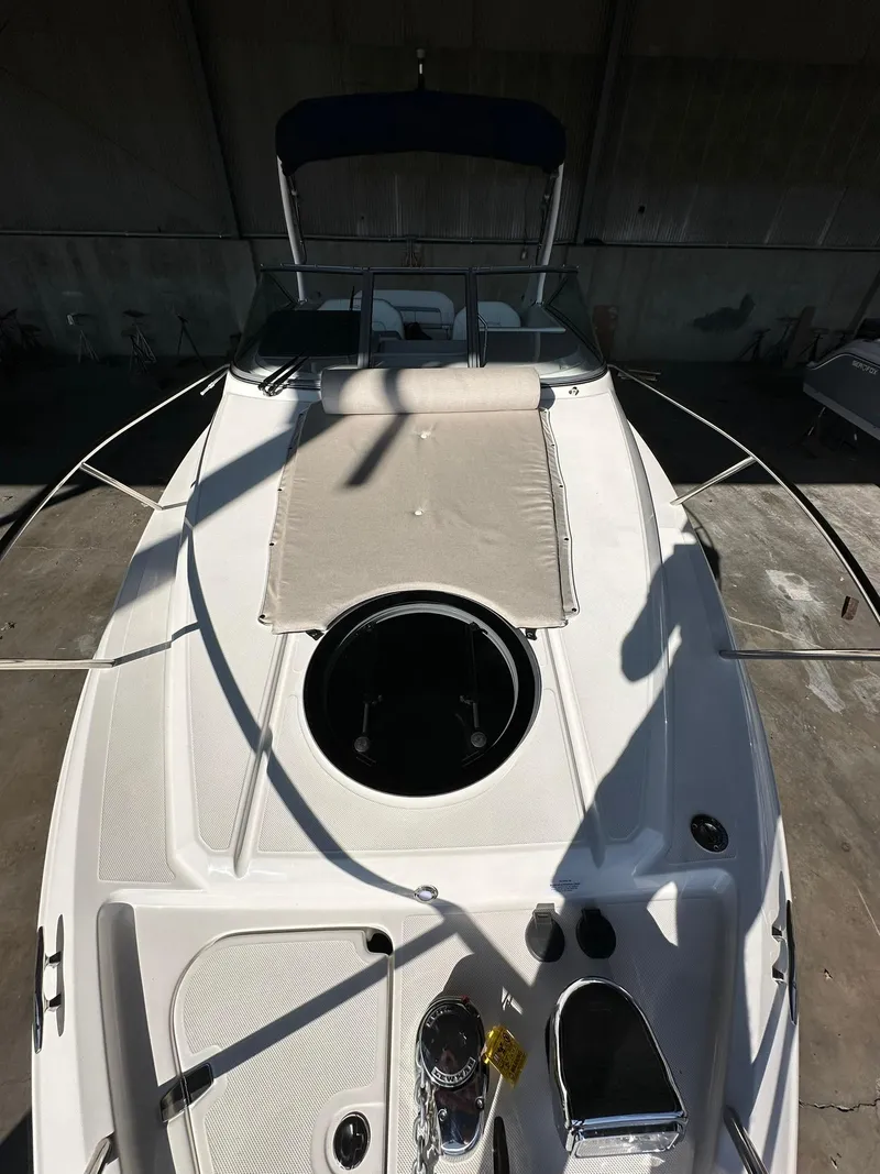 Slide: The Image of 2025 Regal 26XO boat bow with anchor and deck features. - 30