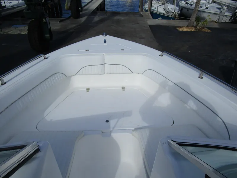 Slide: The Image of 2006 Sea Pro 206 Dual Console boat interior with white seating and open deck. - 10