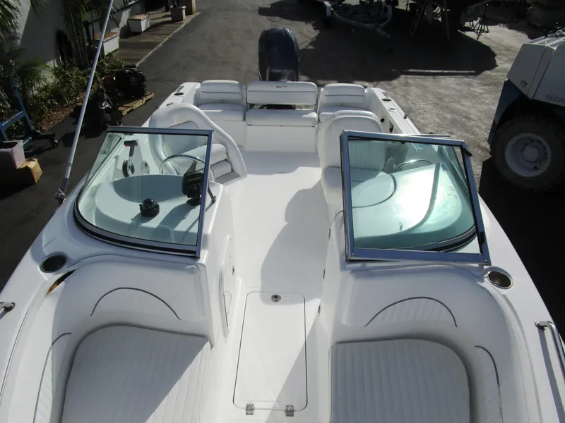 Slide: The Image of 2006 Sea Pro 206 Dual Console boat with open deck and seating. - 14
