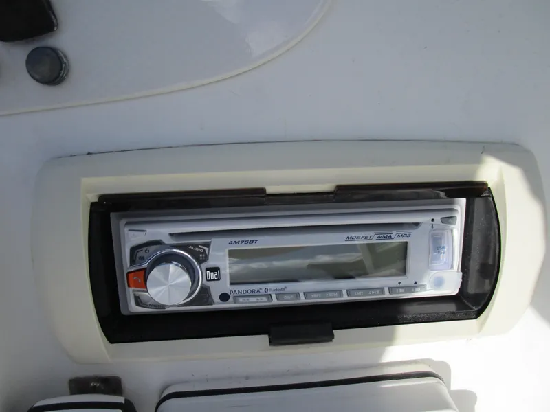 Slide: The Image of Boat stereo system on 2006 Sea Pro 206 Dual Console. - 18