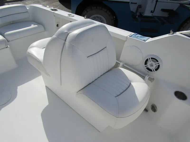 Slide: The Image of White seating on 2006 Sea Pro 206 Dual Console boat interior. - 19