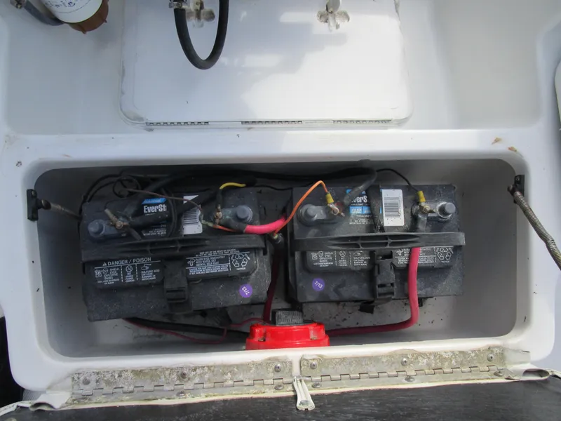 Slide: The Image of Boat battery compartment of 2006 Sea Pro 206 Dual Console with dual batteries. - 22
