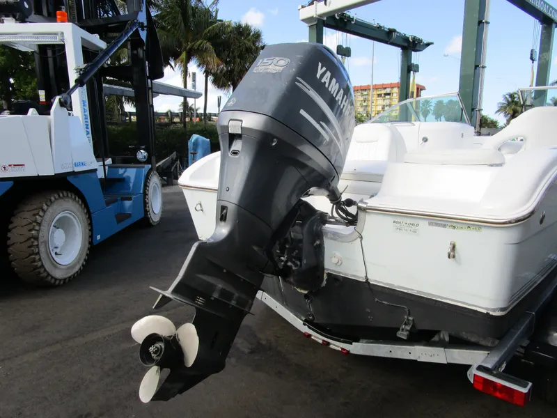 Slide: The Image of 2006 Sea Pro 206 Dual Console with Yamaha outboard motor on a trailer. - 4