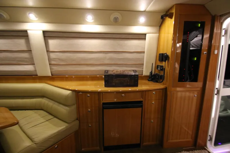 Slide: The Image of Interior of 2008 Riviera 47 Open Flybridge Series II with elegant wood finish. - 10