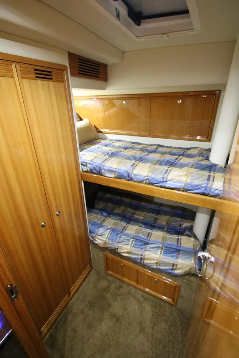 Slide: The Image of Bunk beds in Riviera 47 Open Flybridge Series II, 2008. - 20