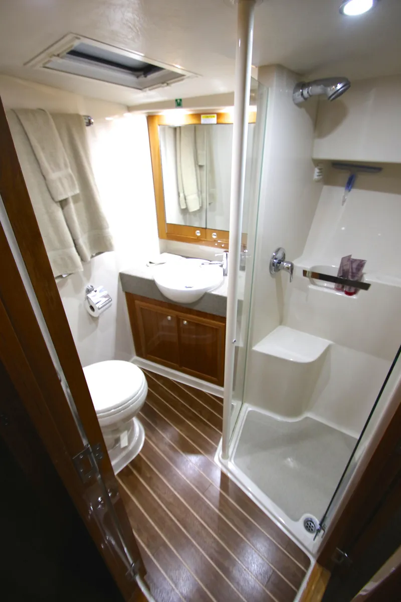 Slide: The Image of Luxurious bathroom in a 2008 Riviera 47 Open Flybridge yacht. - 27