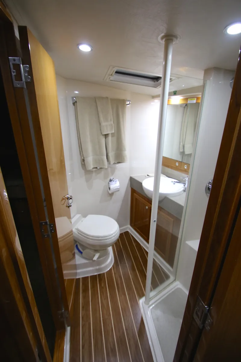 Slide: The Image of Bathroom of Riviera 47 Open Flybridge Series II, 2008 model. - 28