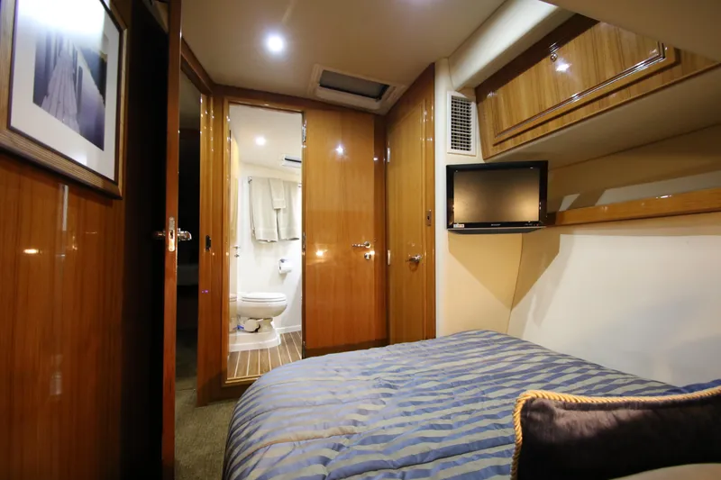 Slide: The Image of Luxurious cabin of 2008 Riviera 47 Open Flybridge with ensuite bathroom. - 31