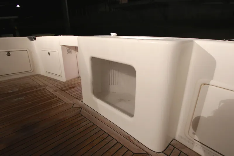 Slide: The Image of Riviera 47 Open Flybridge 2008, teak deck at night. - 36
