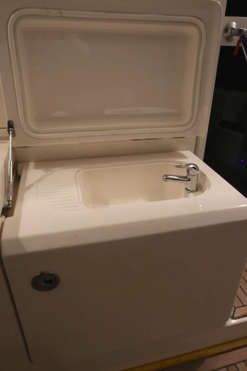 Slide: The Image of Riviera 47 Open Flybridge 2008 cockpit sink area. - 39