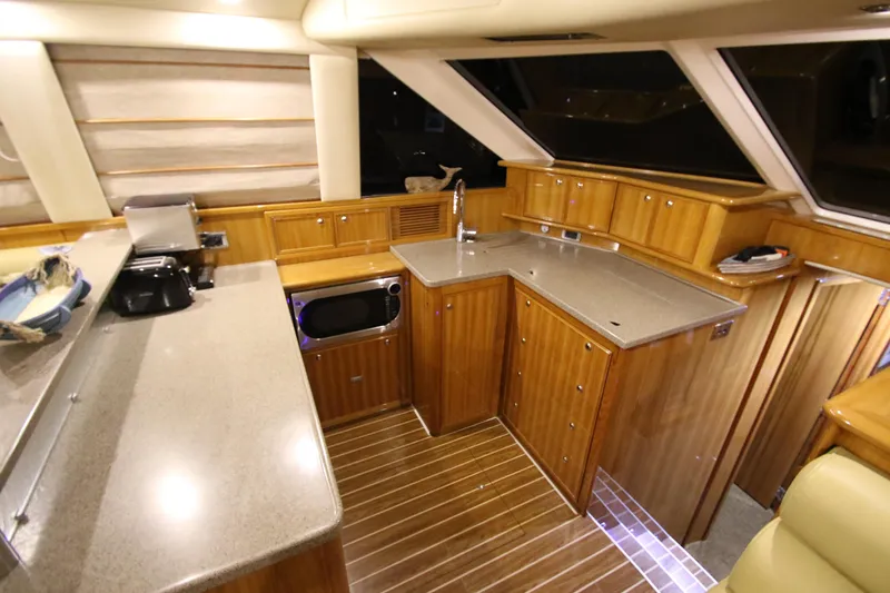 Slide: The Image of Luxurious kitchen in 2008 Riviera 47 Open Flybridge yacht. - 5