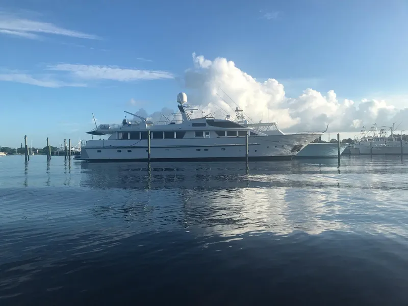 Slide: The Image of Benetti Custom Lloyds M.Y. 1983 yacht on calm water under blue sky. - 3