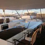 Slide: The Image of Luxury yacht Bravada Knot A Problem #3 & 9, 2011 model, with spacious deck and seating area. - 14