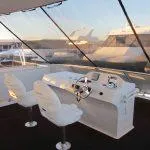 Slide: The Image of Helm of 2011 Bravada Knot A Problem #3 & 9 houseboat with two white captain chairs. - 15