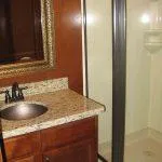 Slide: The Image of Bathroom in 2011 Bravada Knot A Problem #3 & 9 with granite countertop and shower. - 4