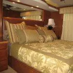 Slide: The Image of Luxurious bedroom in 2011 Bravada Knot A Problem houseboat with elegant bedding. - 9