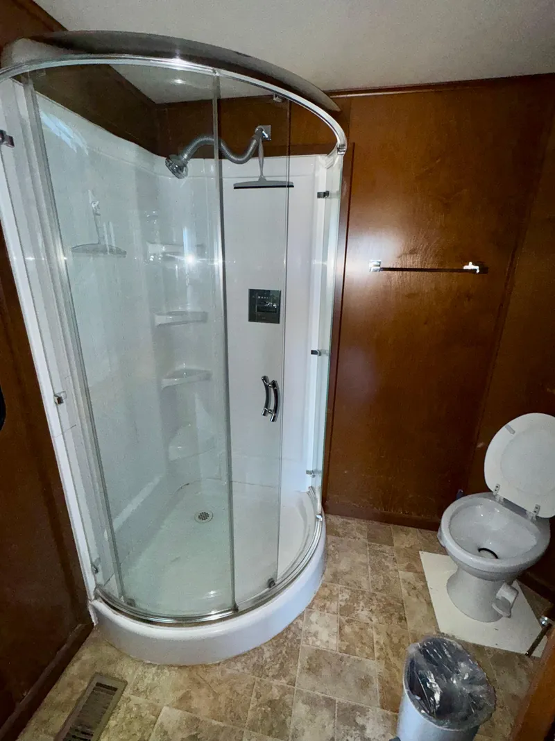 Slide: The Image of Modern bathroom with curved glass shower in 2013 Bravada Bella Luna Share #8. - 15