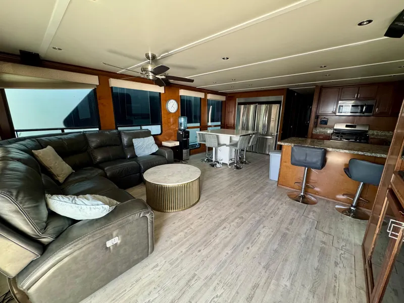 Slide: The Image of Luxurious interior of 2013 Bravada Bella Luna Share #8 houseboat with modern kitchen and seating area. - 4