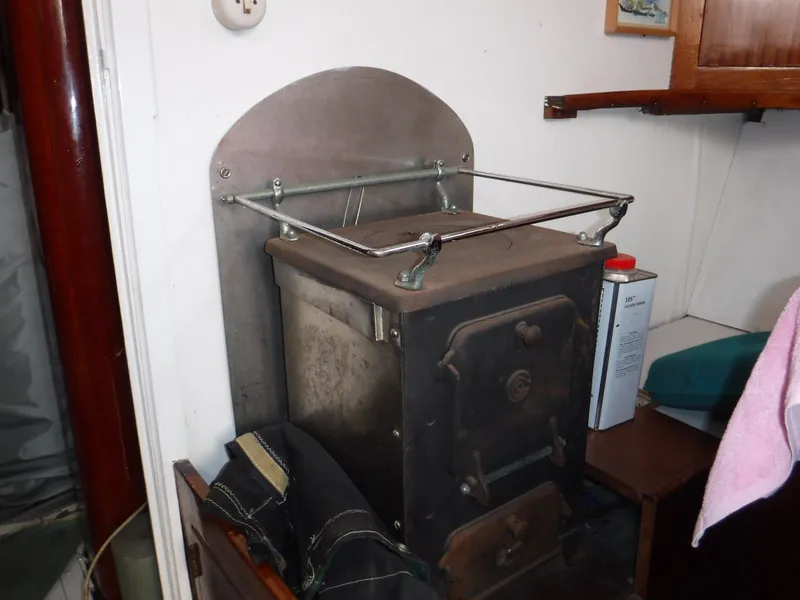 Slide: The Image of Vintage stove in a 1960 Frans Maas-LeFevre One Off Custom 47 steel boat interior. - 19