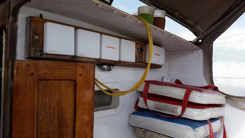 Slide: The Image of Interior of 1960 Frans Maas-LeFevre One Off Custom 47 sailboat with wooden cabinets and cushions. - 27
