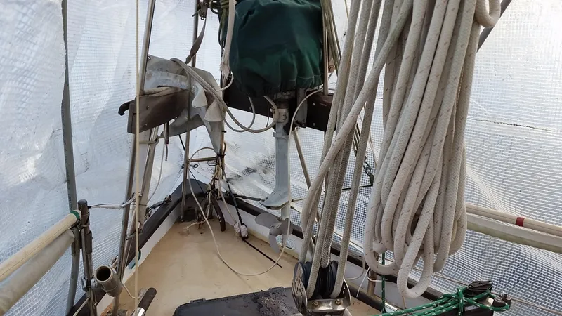 Slide: The Image of Interior view of a 1960 Frans Maas-LeFevre One Off Custom 47 sailboat, showcasing ropes and equipment. - 31