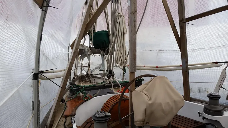 Slide: The Image of Covered deck of 1960 Frans Maas-LeFevre One Off Custom 47 sailboat, showing rigging and equipment. - 32