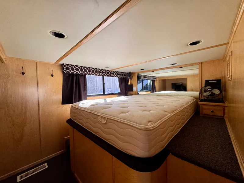 Slide: The Image of Interior of 2006 Sumerset Seas The Day Trip 11 with bed and wooden paneling. - 19