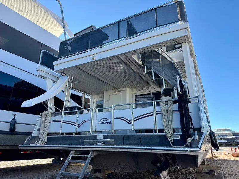 Slide: The Image of 2006 Sumerset Seas The Day Trip 11 houseboat on dry dock, rear view. - 37