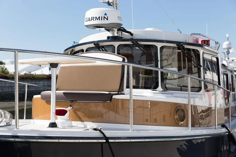 Slide: The Image of 2024 Ranger Tugs R-31 Sedan Luxury Edition boat with Garmin radar. - 11
