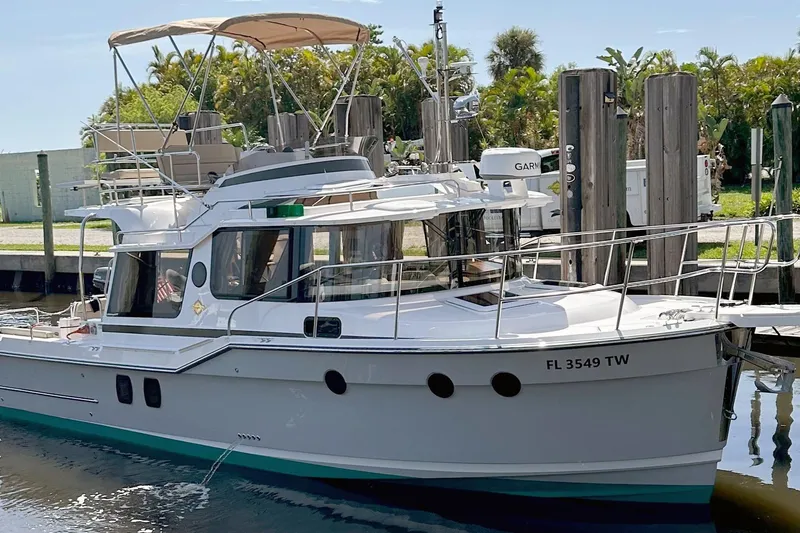 The Image of 2025 Ranger Tugs R-29 CB boat docked, featuring sleek design and modern amenities. - 0